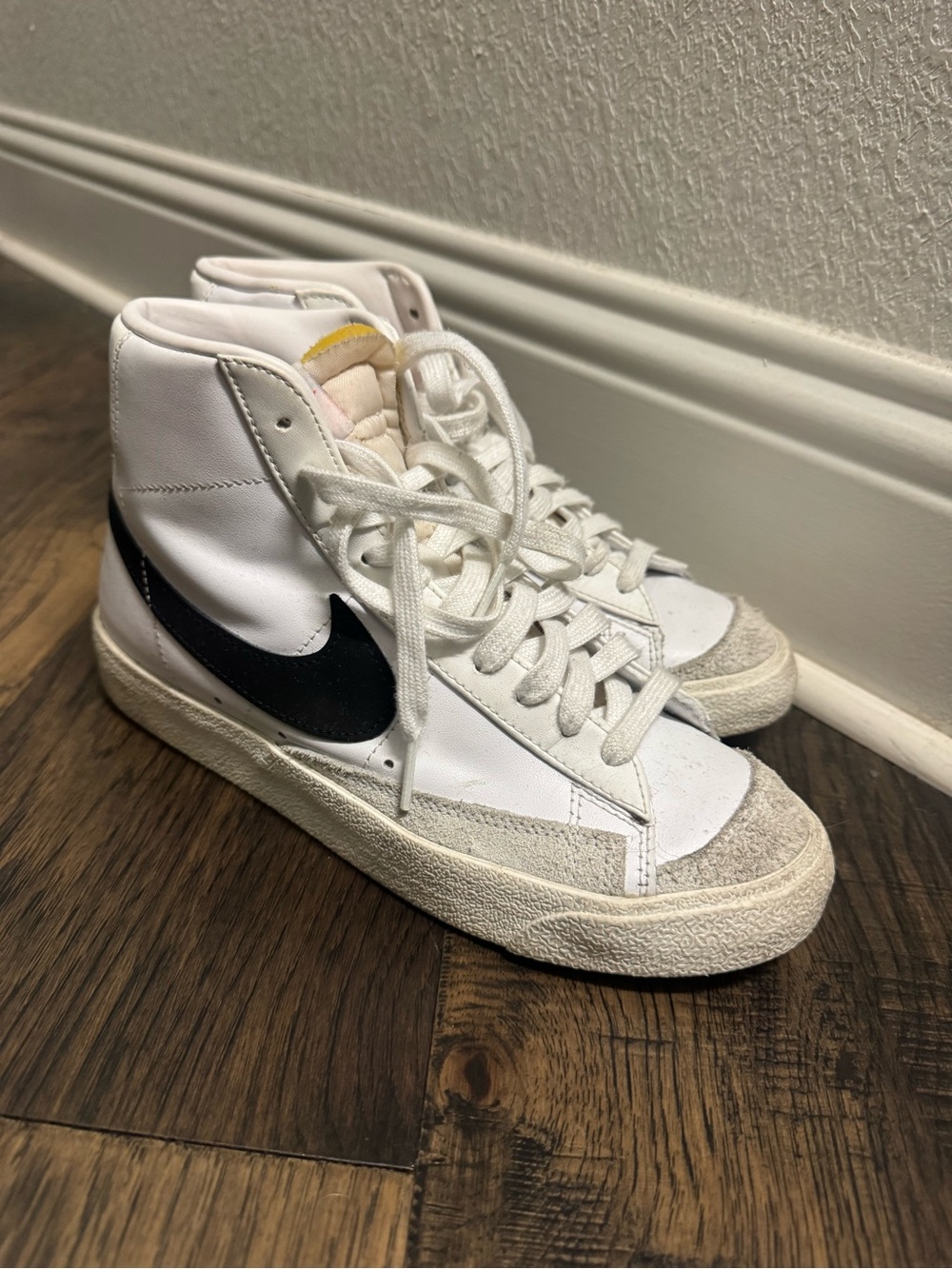 Nike White High-Top Sneakers with Black Swoosh - Women’s 8.5